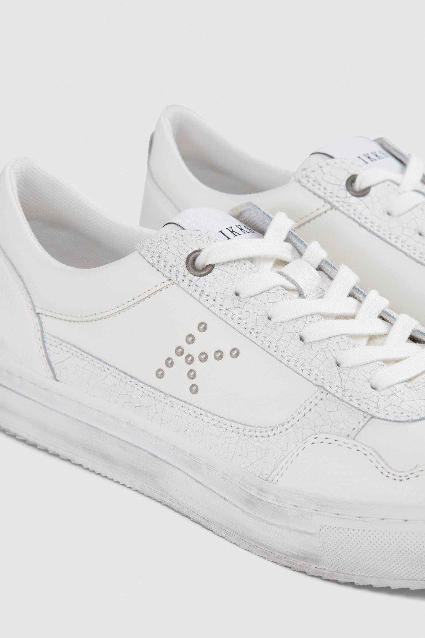 WOMEN’S WHITE LEATHER K STUDDED TRAINERS 6