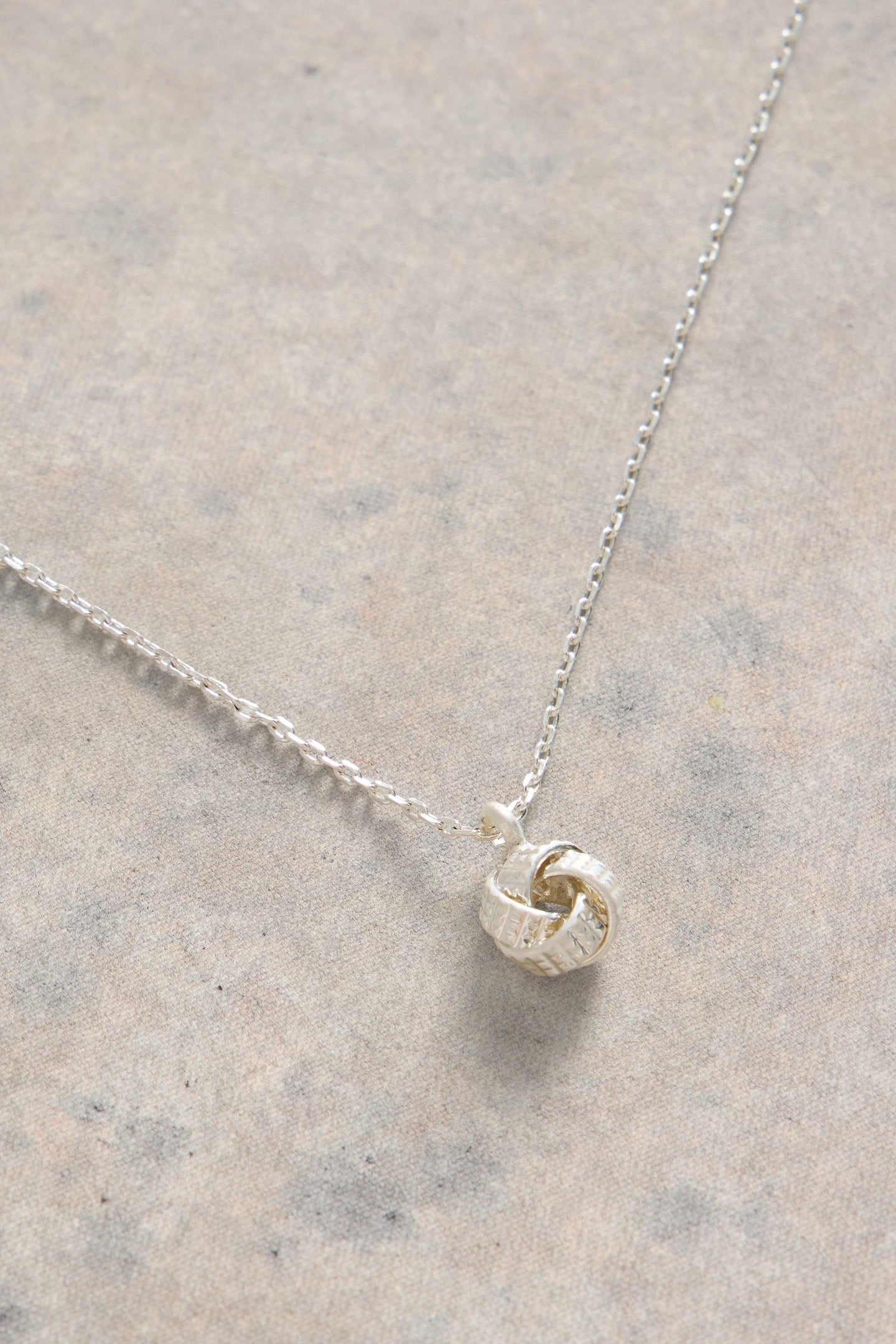 KNOT CHARM FINE NECKLACE SILVER TONE METALLIC 1