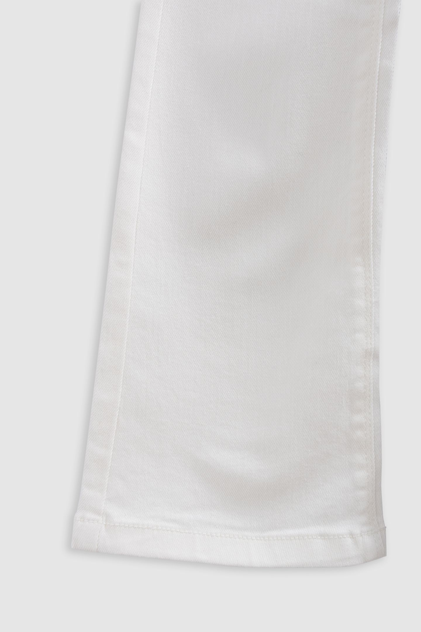 FLARE ECRU JEANS WITH STUD AND EYELET DECORATION 3