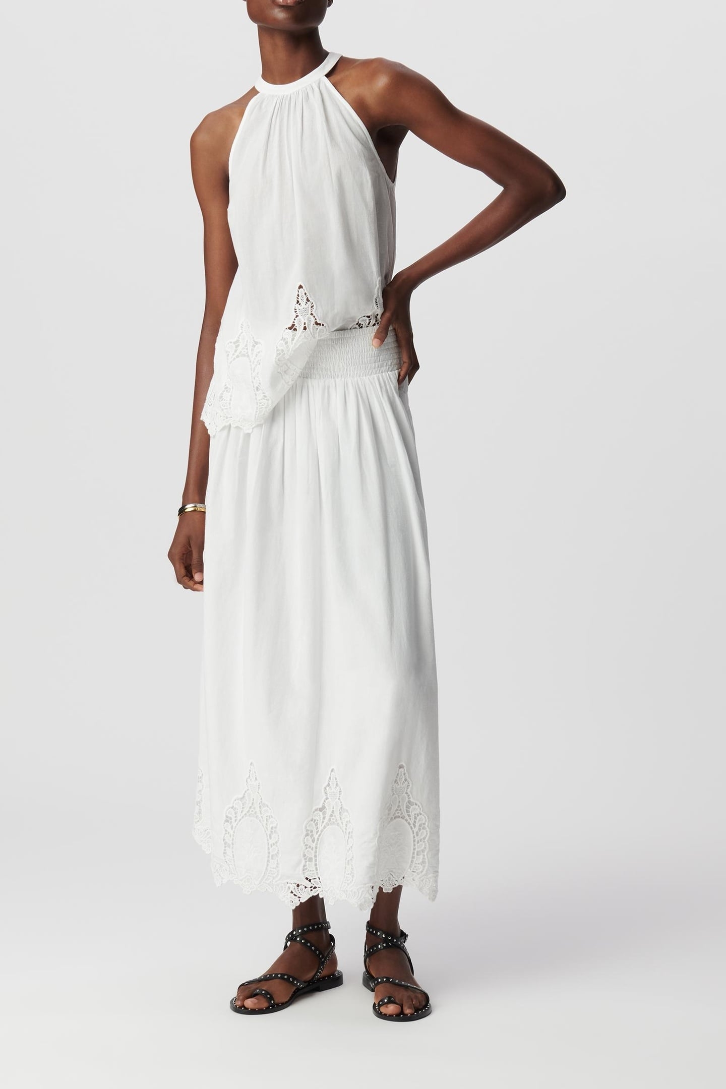 LONG WHITE SKIRT DECORATED WITH LACE EMBROIDERY 1