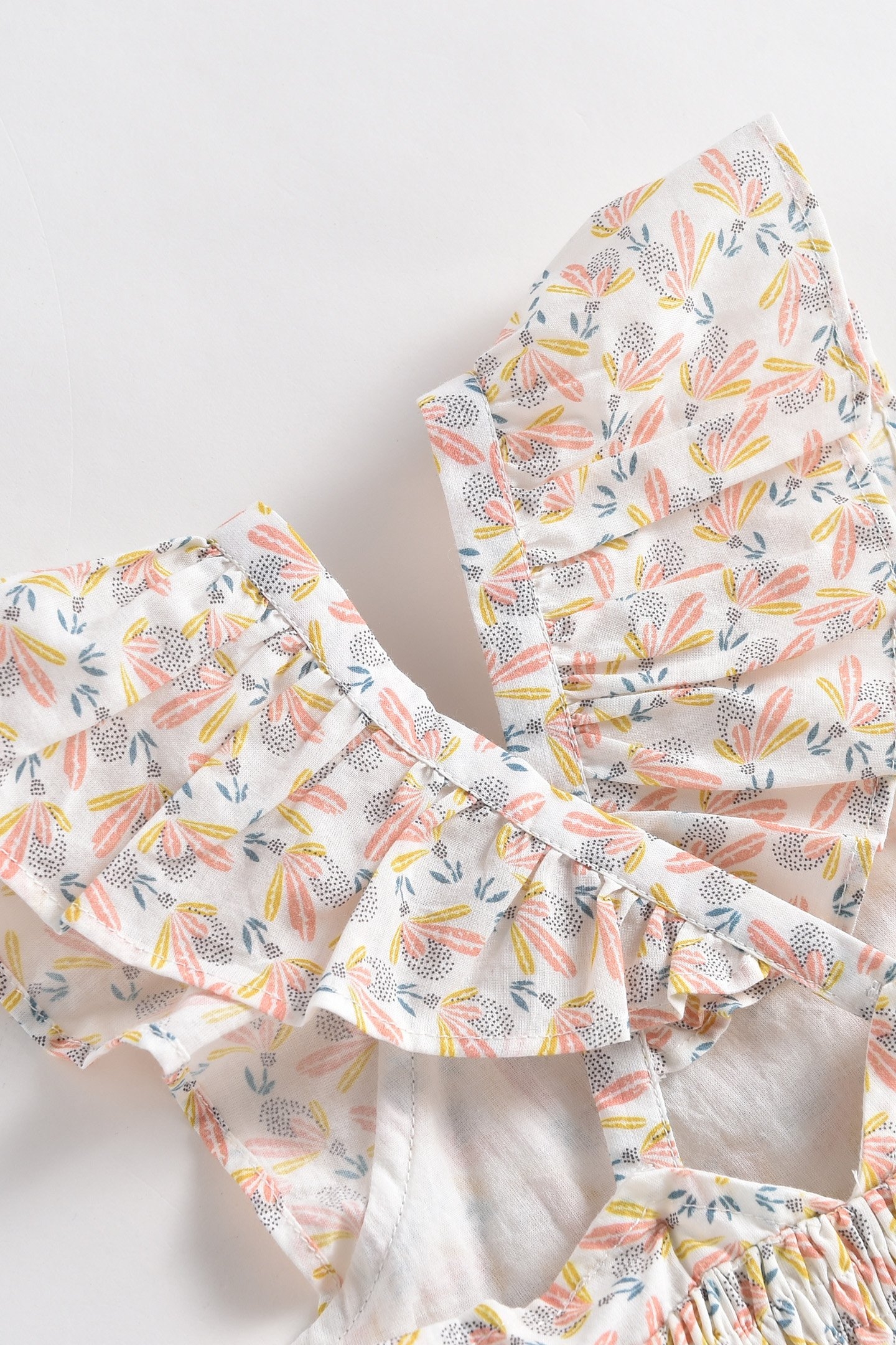 TOP AJEYA CREAM PETALS 7